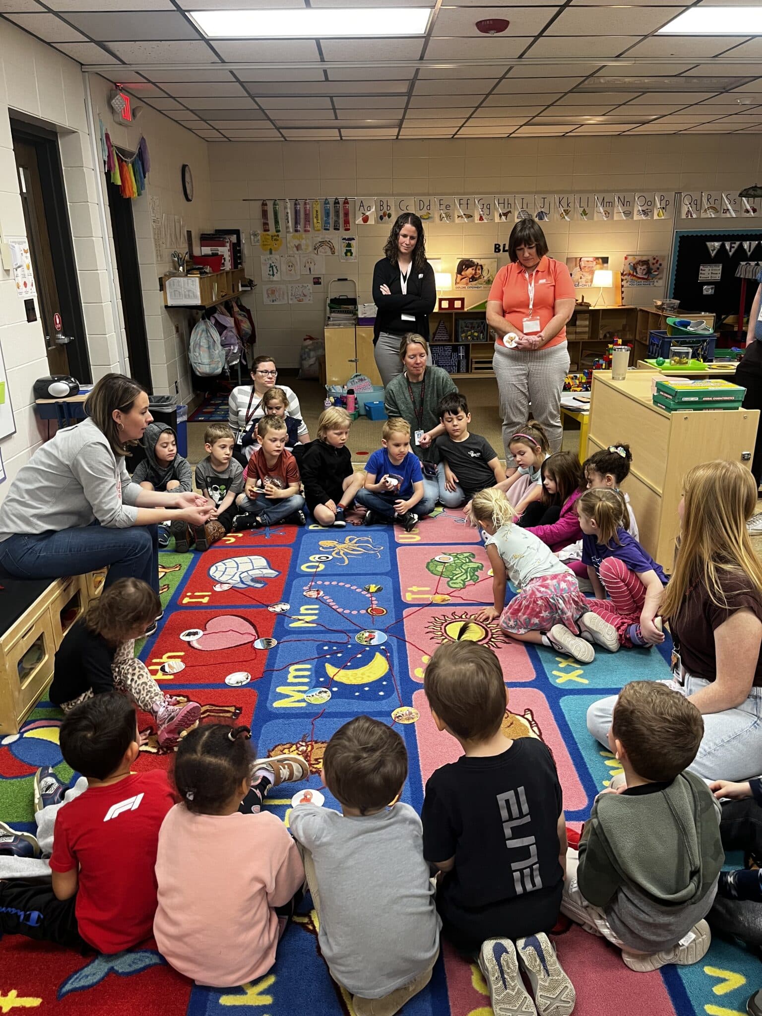 Farm Bureau members and MAITC staff interacting with youth over agricultural literacy.