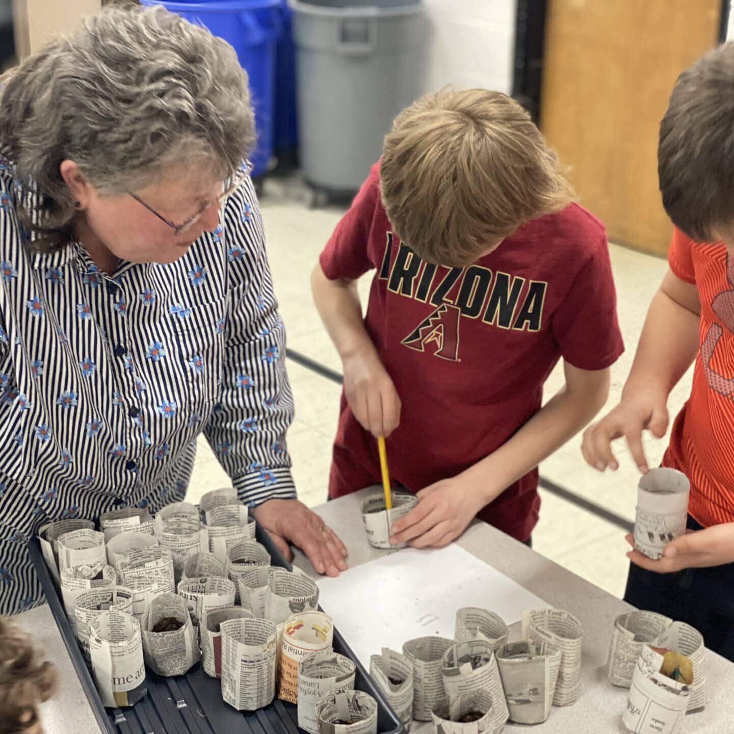 K 12 Educator Opportunities: Children Collaborating On A Table With Paper Cups K 12 Educator Opportunities: Children Collaborating On A Table With Paper Cups